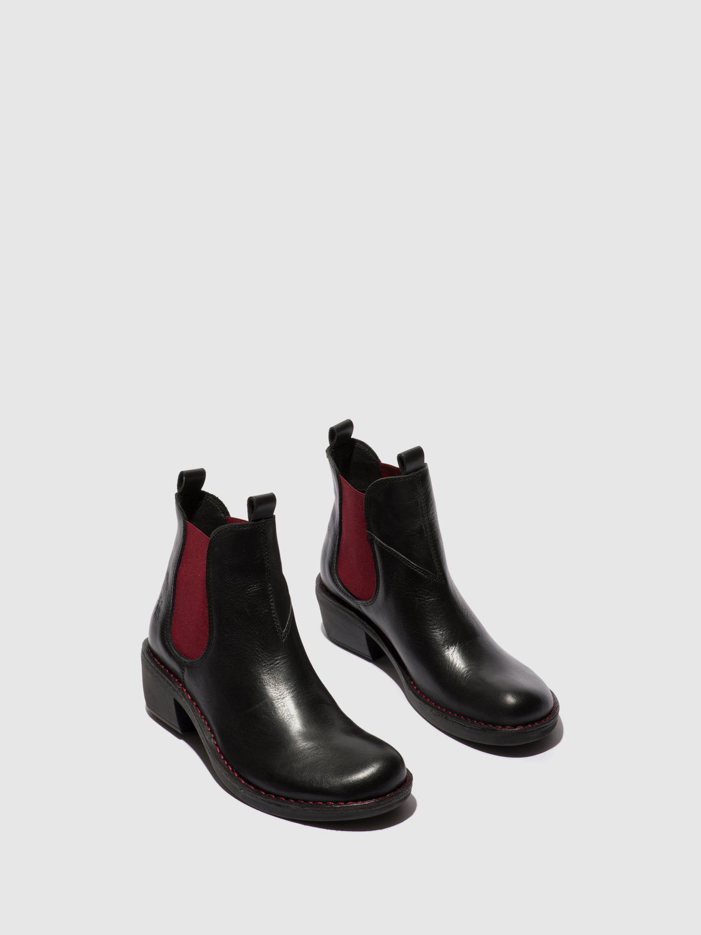 Black chelsea boots with red elastic hotsell